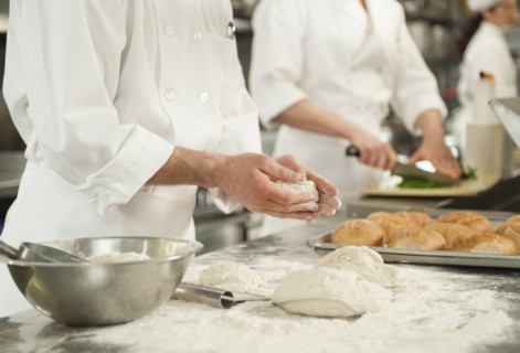 Chef doing pastry to make rolls.