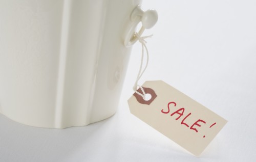 Close-up of label with "sale" sign. Photo : Chris Hackett