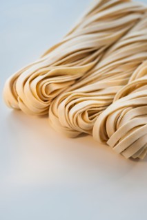 Studio shot of fresh linguini pasta.