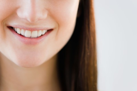 Close up of young woman's mouth. Photo : Jamie Grill Photography