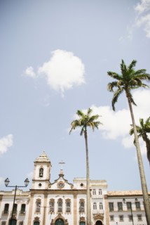 Brazil, Bahia, Salvador De Bahia, Facade of old church with palm trees in front. Photo : Jamie