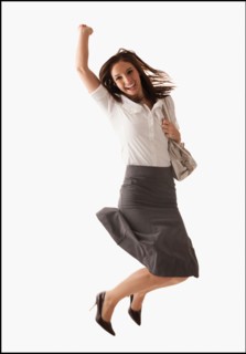 Studio shot of cheering woman. Photo : Mike Kemp