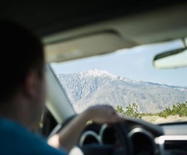 USA, California, Palm Springs, Coachella Valley, San Gorgonio Pass, Close up of man inside car.