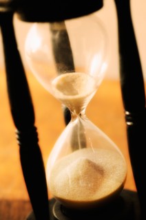 Hourglass with pouring sand.