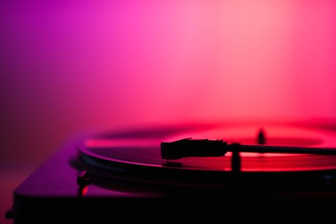 Close up of turntable on pink background. Photo : Daniel Grill