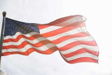 American flag against sky. Photo : fotog