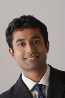 Portrait of young businessman, studio shot. Photo : Rob Lewine