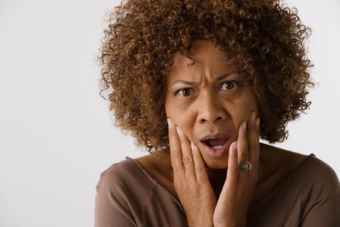 Portrait of mature woman, studio shot. Photo : Rob Lewine