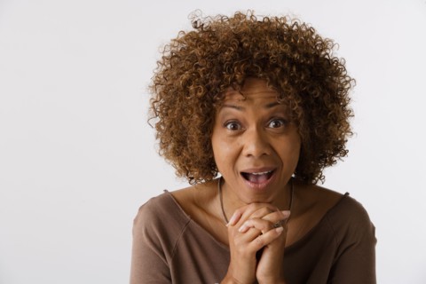 Portrait of mature woman, studio shot. Photo: Rob Lewine