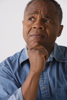 Portrait of mature man, studio shot. Photo : Rob Lewine