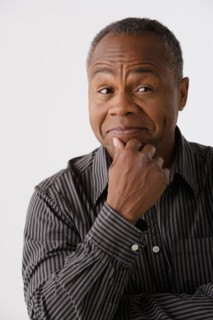 Portrait of mature man, studio shot. Photo : Rob Lewine
