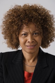 Portrait of mature businesswoman, studio shot. Photo: Rob Lewine