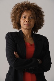 Portrait of mature businesswoman, studio shot. Photo : Rob Lewine