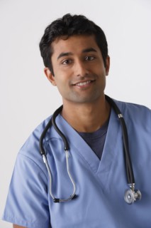 Portrait of young male nurse, studio shot. Photo : Rob Lewine