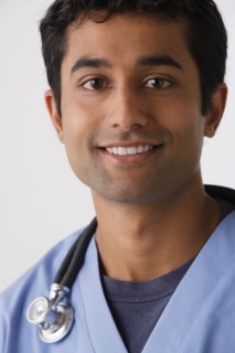 Portrait of young male nurse, studio shot. Photo : Rob Lewine