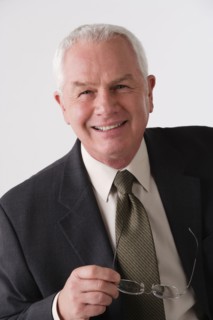 Portrait of senior businessman, studio shot. Photo : Rob Lewine