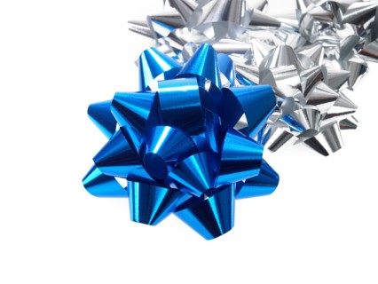 Studio shot of Blue and Silver Ribbon on white background. Photo : David Arky
