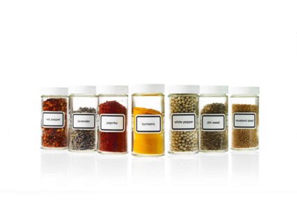 Studio shot of Jars with spices on white background. Photo : David Arky