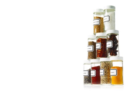 Studio shot of Jars with spices on white background. Photo : David Arky