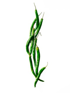 Studio shot of green chili peppers. Photo : David Arky