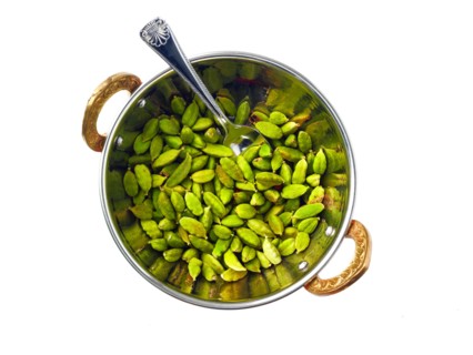 Studio shot of cardamom seeds in bowl. Photo: David Arky