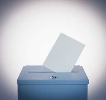 Ballot box and blank paper, studio shot. Photo : Daniel Grill