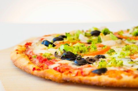 Pizza with vegetable topping.