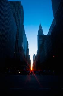 USA, New York, New York City, Chrysler Building and street at sunset.