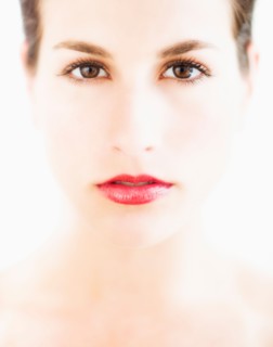 Studio portrait of young woman.