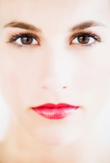 Studio portrait of young woman.