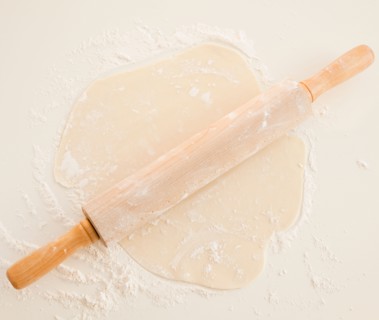 Close up of dough and roller pin. Photo : Jamie Grill