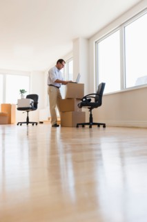 Businessman setting up office.