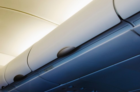 Overhead storage compartment in airplane.