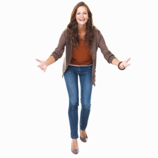 Studio shot of young enthusiastic woman smiling. Photo : momentimages