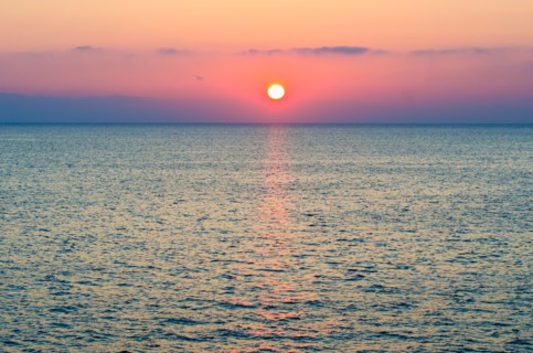 Aegean Sea horizon at sunset.