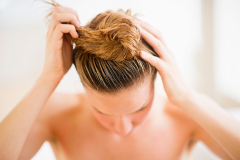 Woman washing hair.