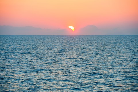 Aegean Sea horizon at sunset.