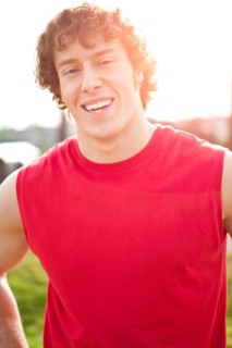 Portrait of young athlete smiling. Photo: Take A Pix Media