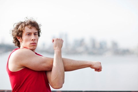 USA, Washington State, Seattle, Young athlete doing workout. Photo : Take A Pix Media
