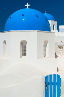 Greece, Cyclades Islands, Santorini, Oia, Church dome with cross.