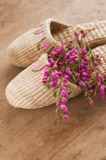 Flowers on slippers at spa.