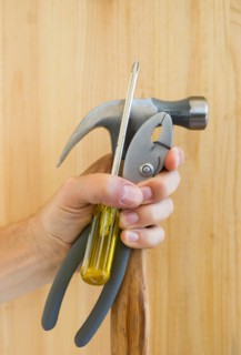 Hand holding tools.