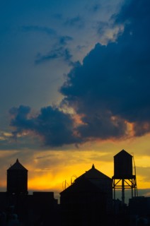 USA, New York City, silhouettes of buildings at sunset.