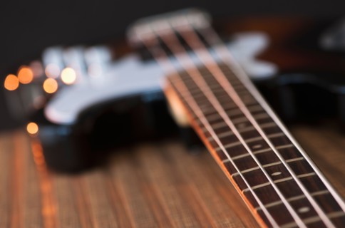 Close up of bass guitar. Photo : Daniel Grill