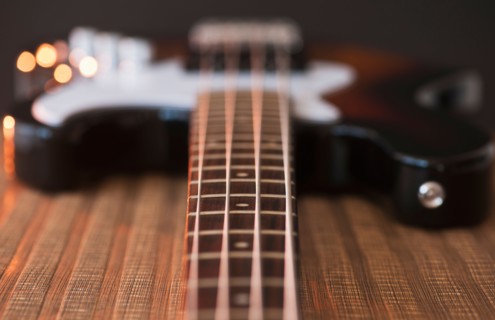 Close up of bass guitar. Photo : Daniel Grill