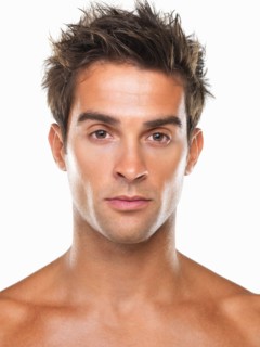 Studio portrait of young attractive man. Photo : momentimages