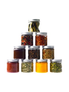 Studio shot of jars with spices. Photo : David Arky