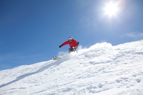 Male skier on fresh powder snow