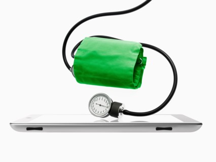 Studio shot of blood pressure gauge on digital tablet. Photo : David Arky