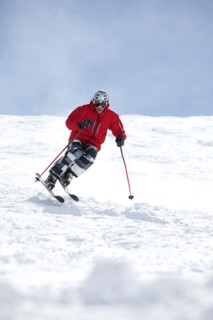 Male skier on fresh powder snow